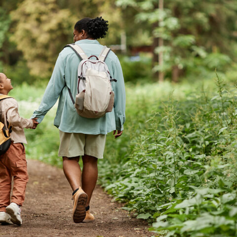 mother and child walking in nature
