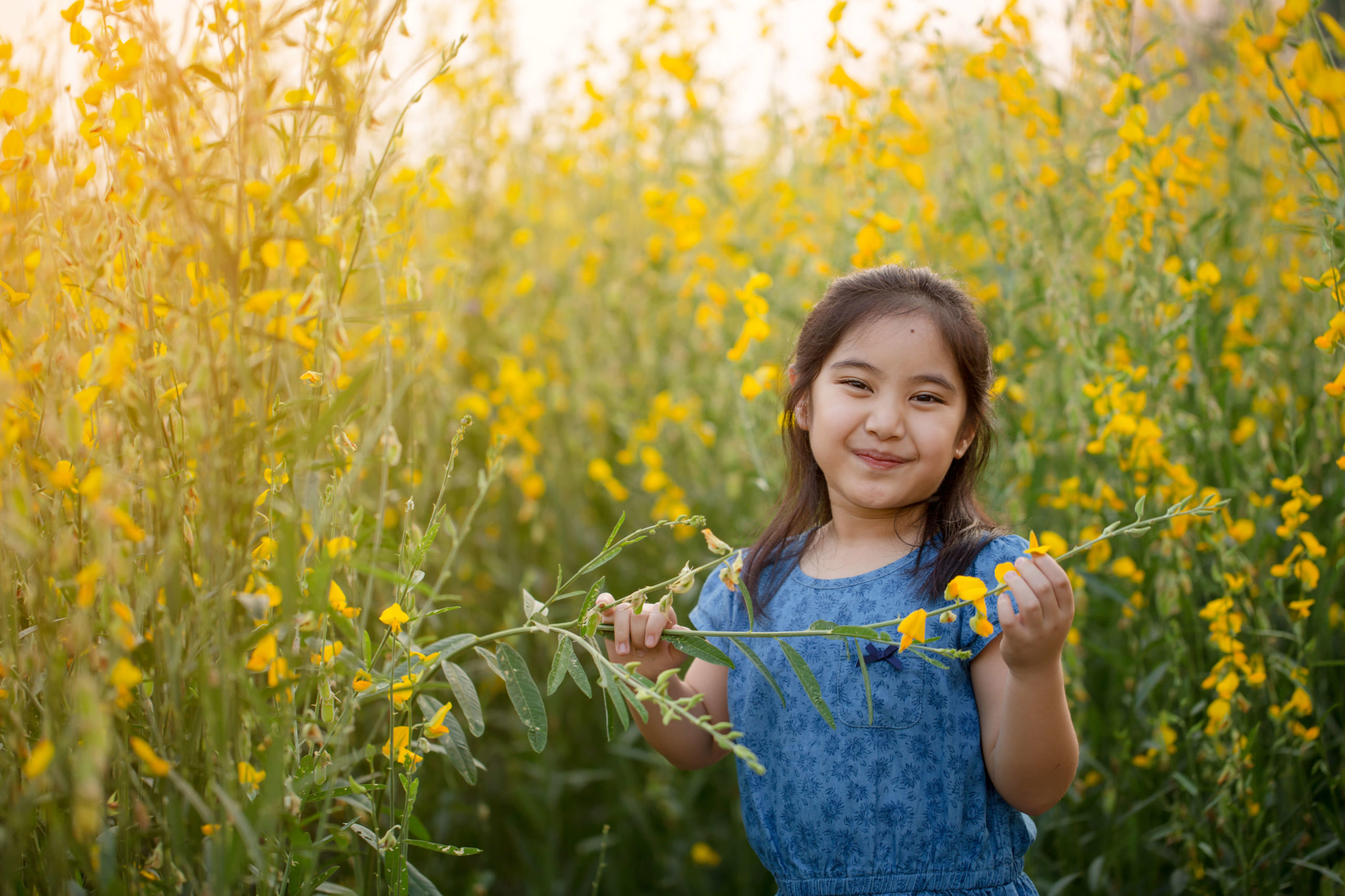 aba-sacramento-happy-child-outside-in-field-of-flowers