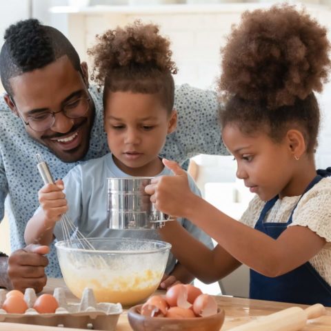 Happy Dad Teaching Two Cute Preschooler Kids To Bake