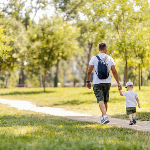 father and son at park